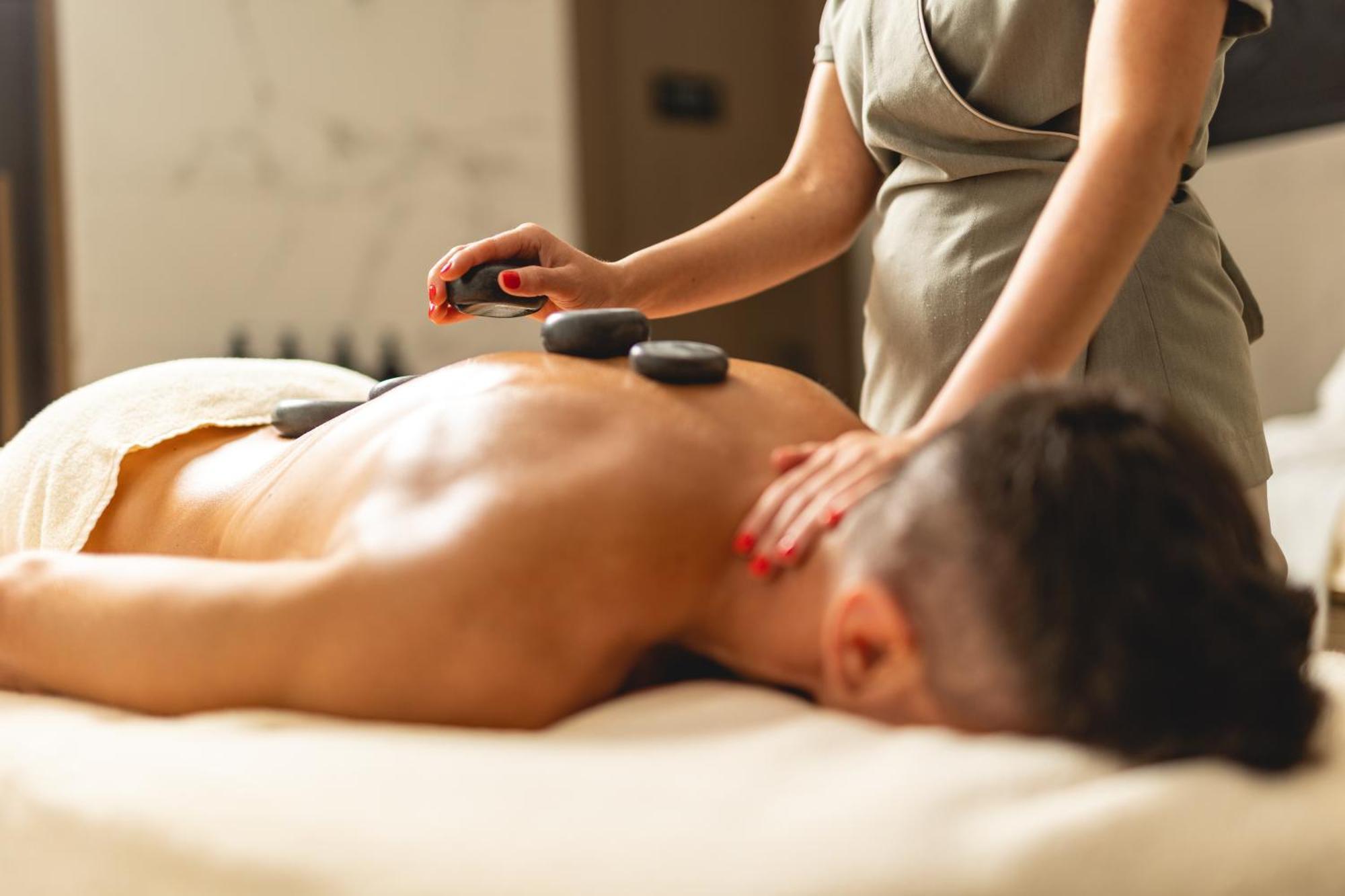 Hilton Rijeka Costabella Beach Resort And Spa Bagian luar foto Hot stone massage