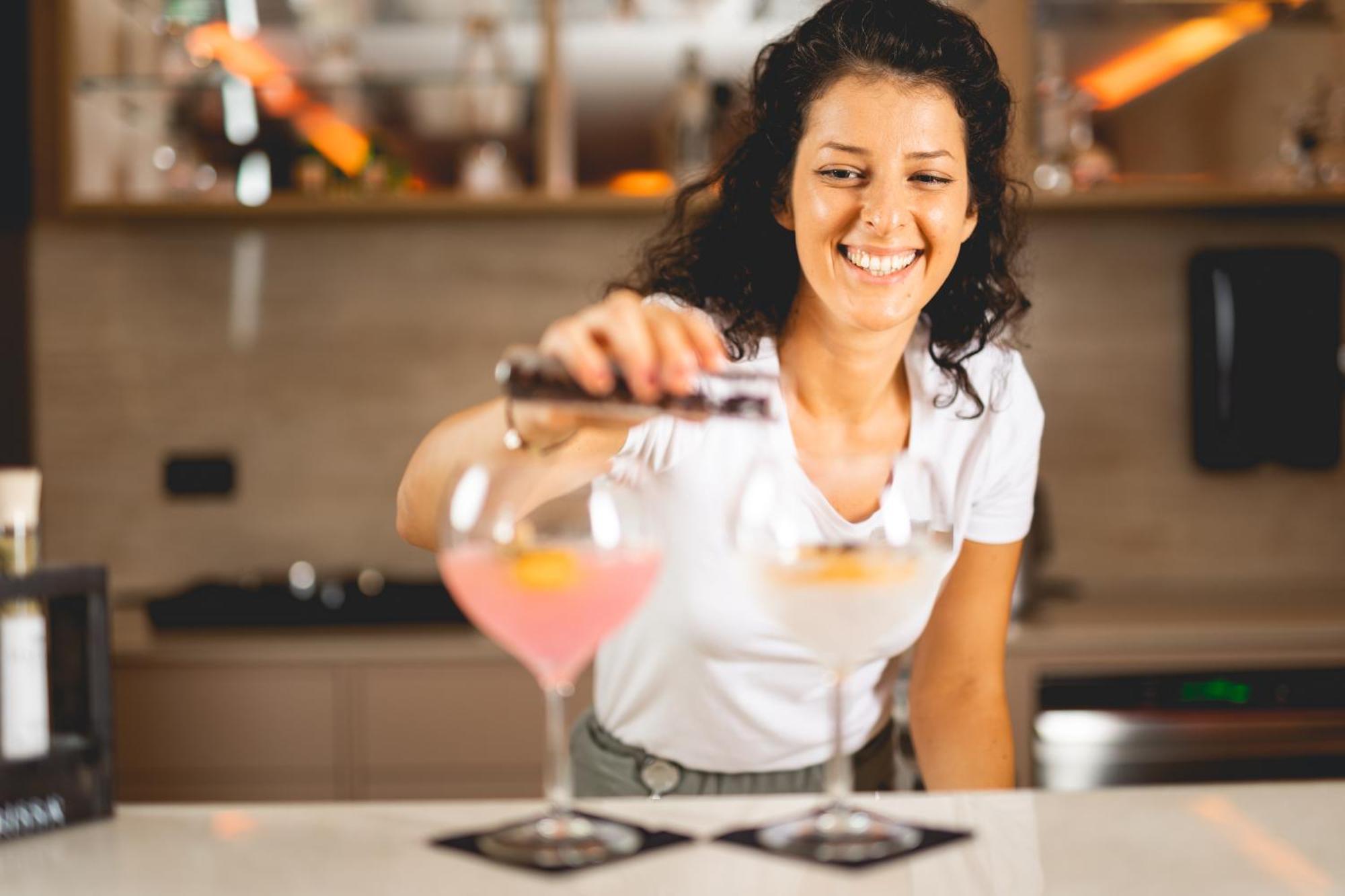 Hilton Rijeka Costabella Beach Resort And Spa Bagian luar foto A bartender at work