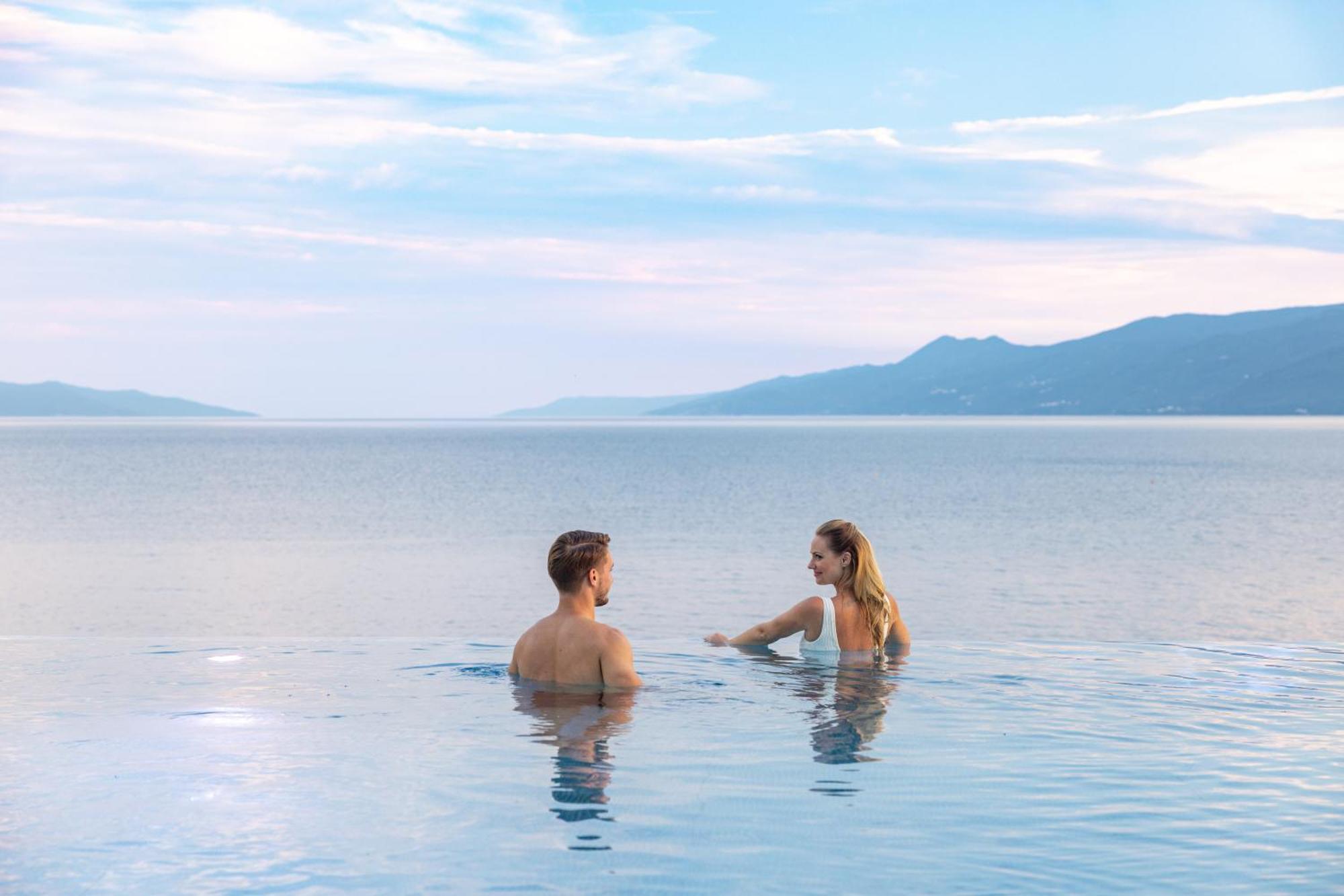 Hilton Rijeka Costabella Beach Resort And Spa Bagian luar foto Bathing in the Dead Sea